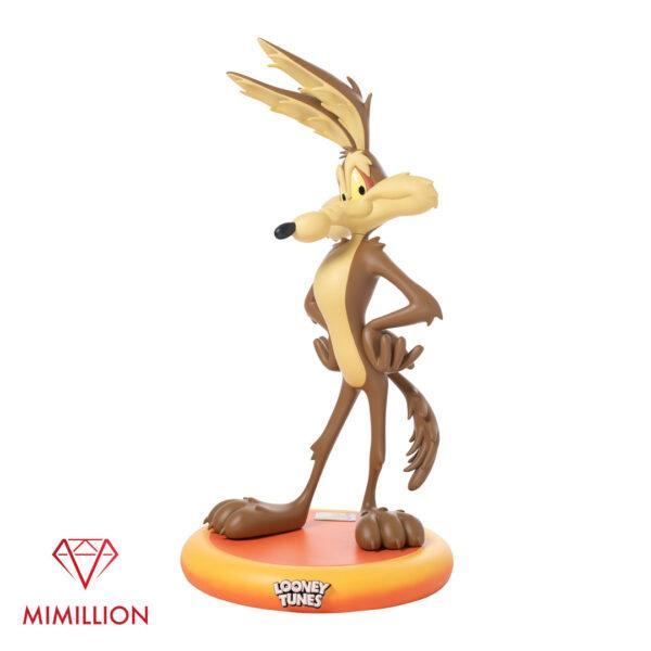 Angled front-facing image of life-size Wile E Coyote model standing with hand on hips